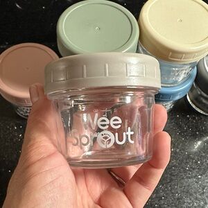 WeeSprout glass baby food storage jars with lids.